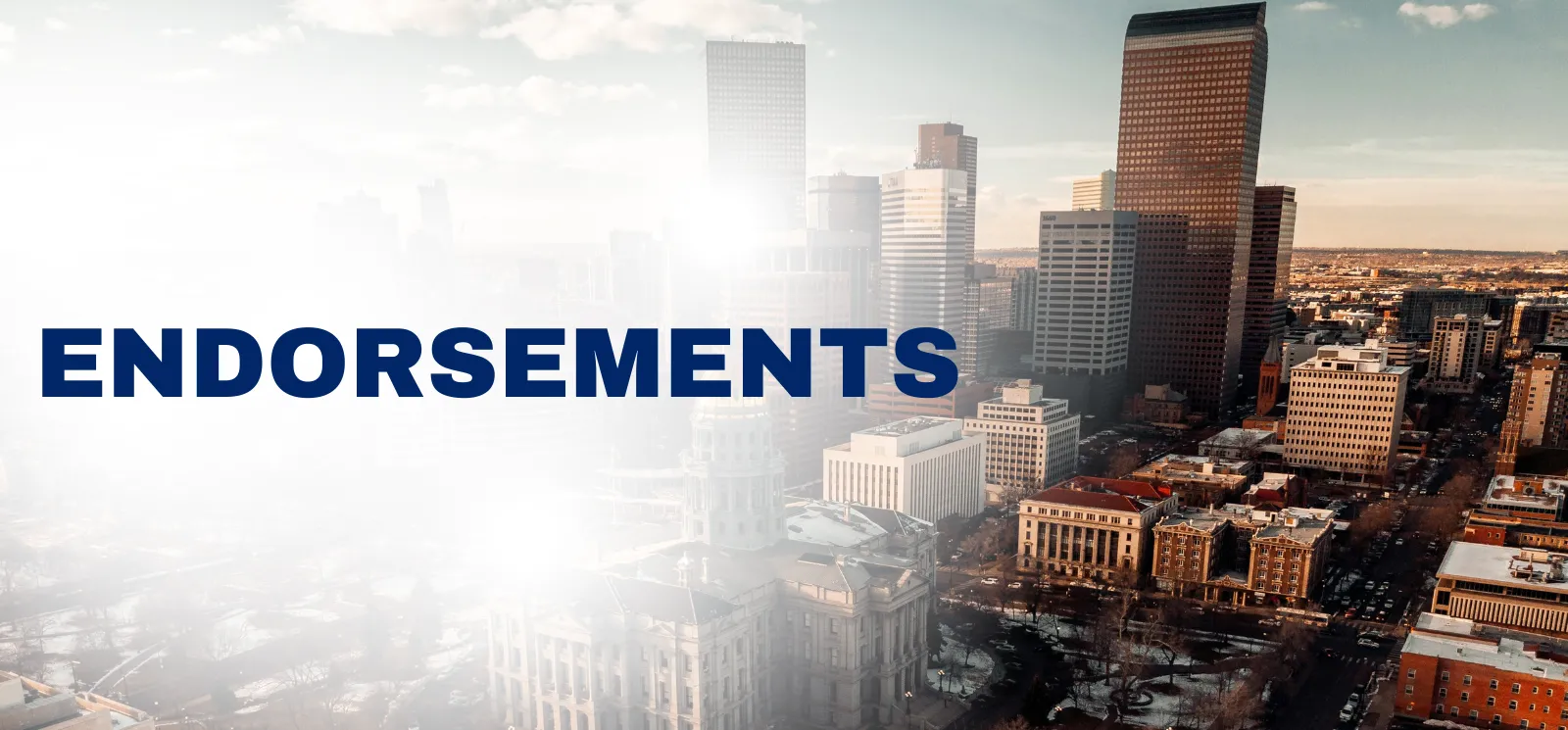 "Endorsements" superimposed over the Denver skyline